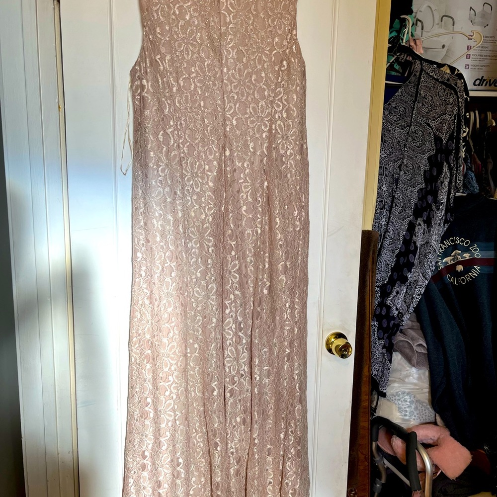 Ralph Richard’s full length dress with beautiful front detailed neckline.
